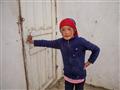10 ročná Kirgizska Aigul z dedinky Aličor (3850 m). Červené líčka jej pasujú k šatke na hlave. foto: