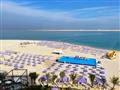 Pohľad na pláž z izby v Centara Mirage Beach Resort