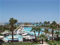 Komplex bazénov s palmami v hoteli Arabia Azur