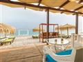 Hotel Kokkari Beach: fotografie vybavení exteriérů a interiérů ubytování.