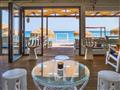 Hotel Kokkari Beach: fotografie vybavení exteriérů a interiérů ubytování.