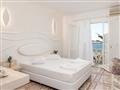 Hotel Kokkari Beach: fotografie vybavení exteriérů a interiérů ubytování.