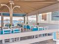 Hotel Kokkari Beach: fotografie vybavení exteriérů a interiérů ubytování.