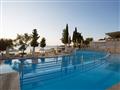 Hotel Porto Galini Seaside Resort & Spa: fotografie vybavení exteriérů a interiérů ubytování.
