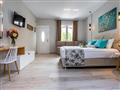Aparthotel Aldebaran: fotografie vybavení exteriérů a interiérů ubytování.