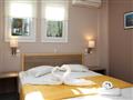 Aparthotel Scorpios: fotografie vybavení exteriérů a interiérů ubytování.