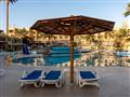 Hotel Palm Beach Resort: fotografie vybavení exteriérů a interiérů ubytování.