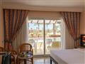 Hotel Palm Beach Resort: fotografie vybavení exteriérů a interiérů ubytování.