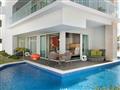 Swank Wraparound Swim-Up Suite